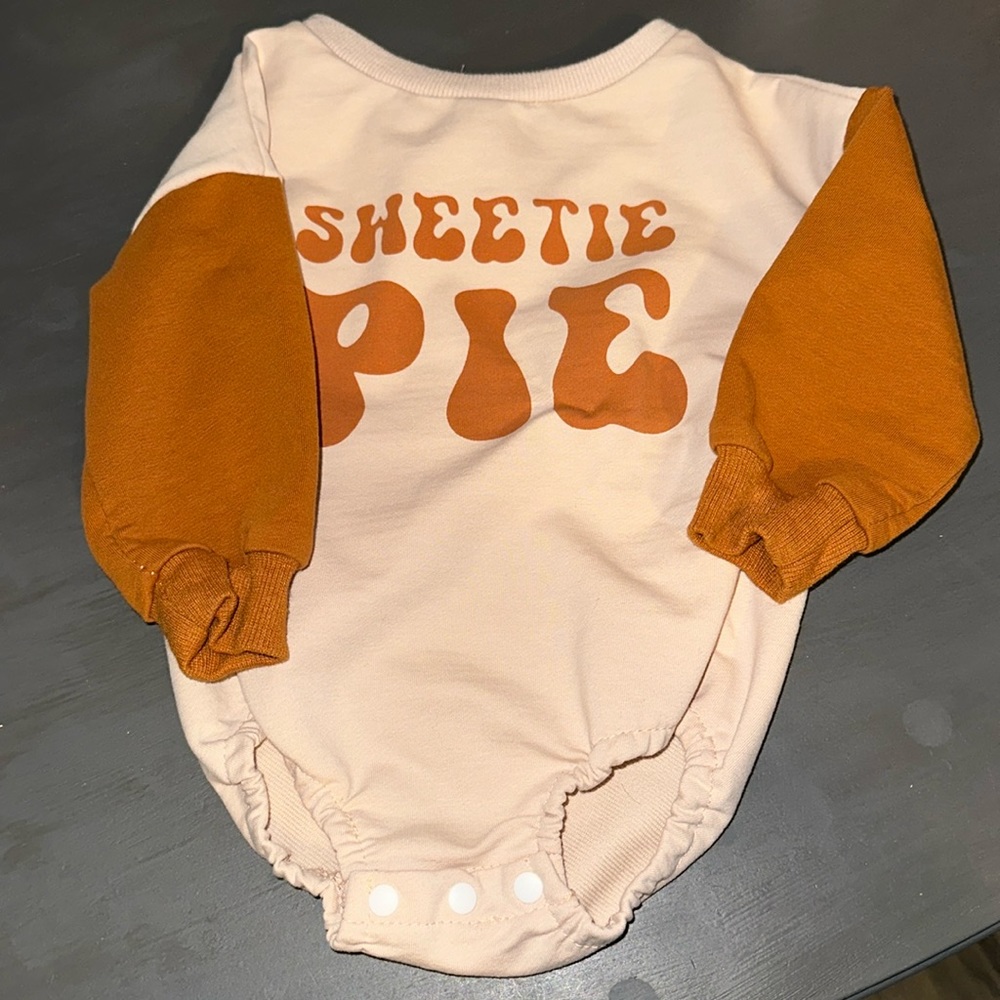 New never worn crew neck bubble romper